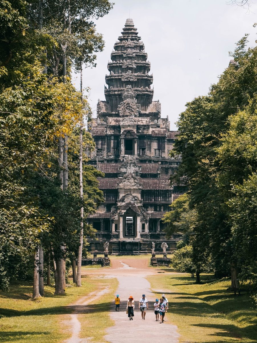 A majestic temple stands tall, framed by trees.